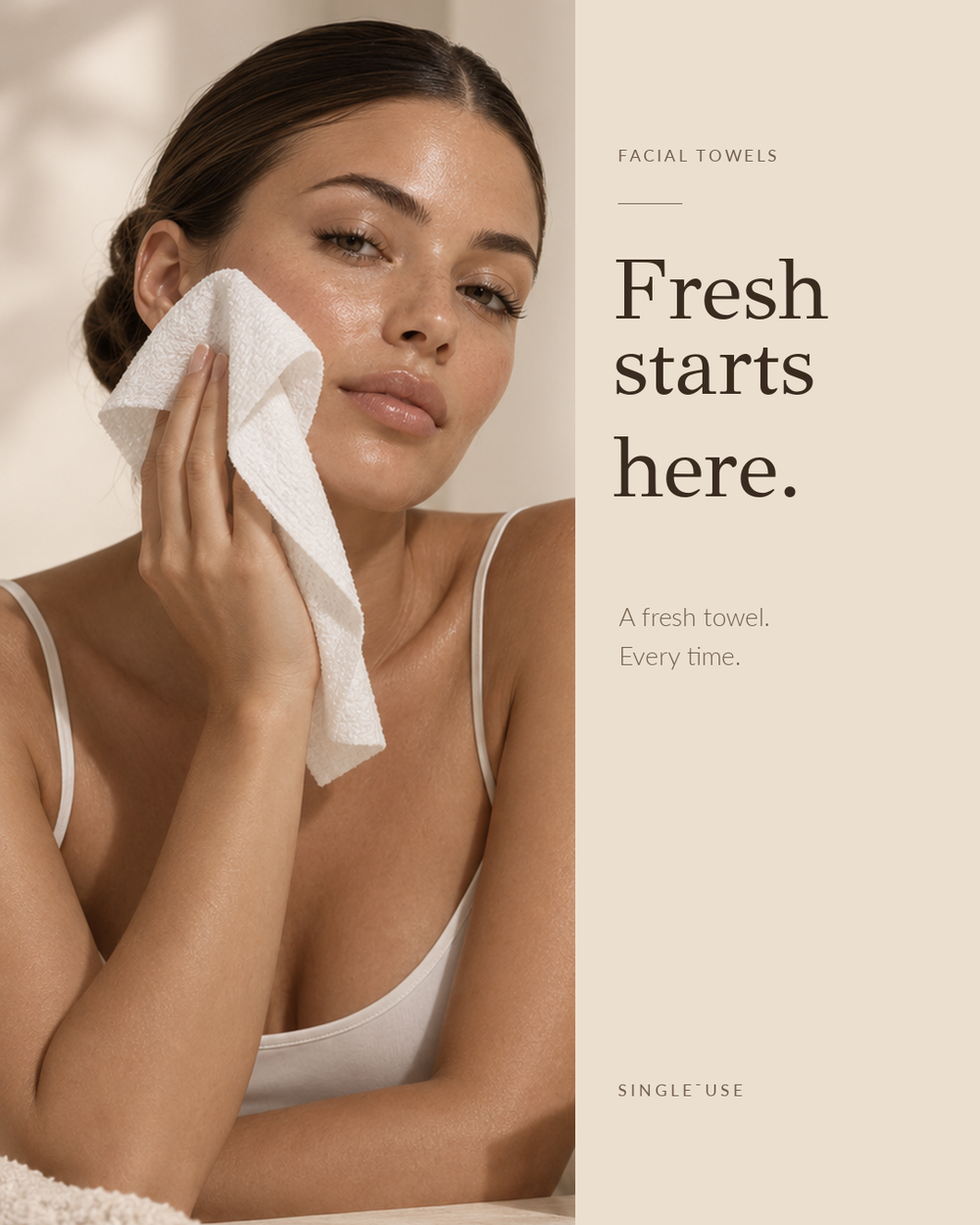 Model drying her face with a facial towel